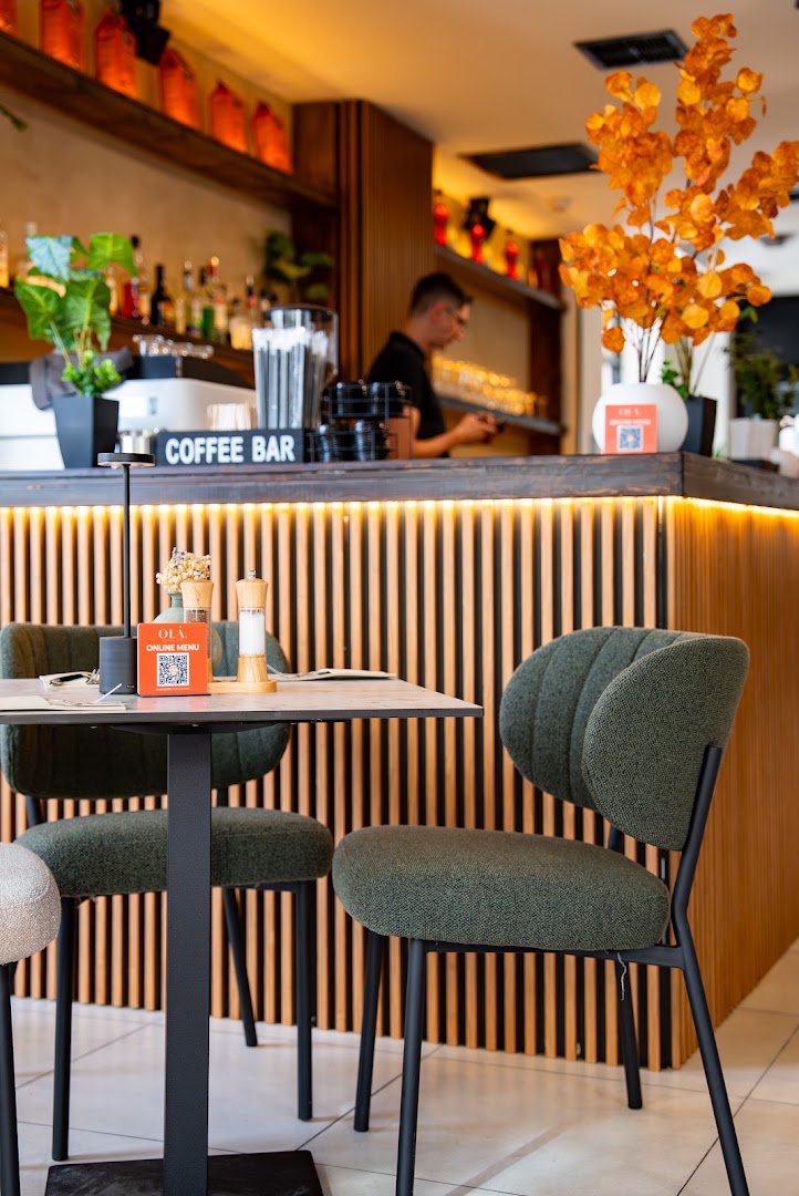 Ola Cafe: inviting and professional cafe interior