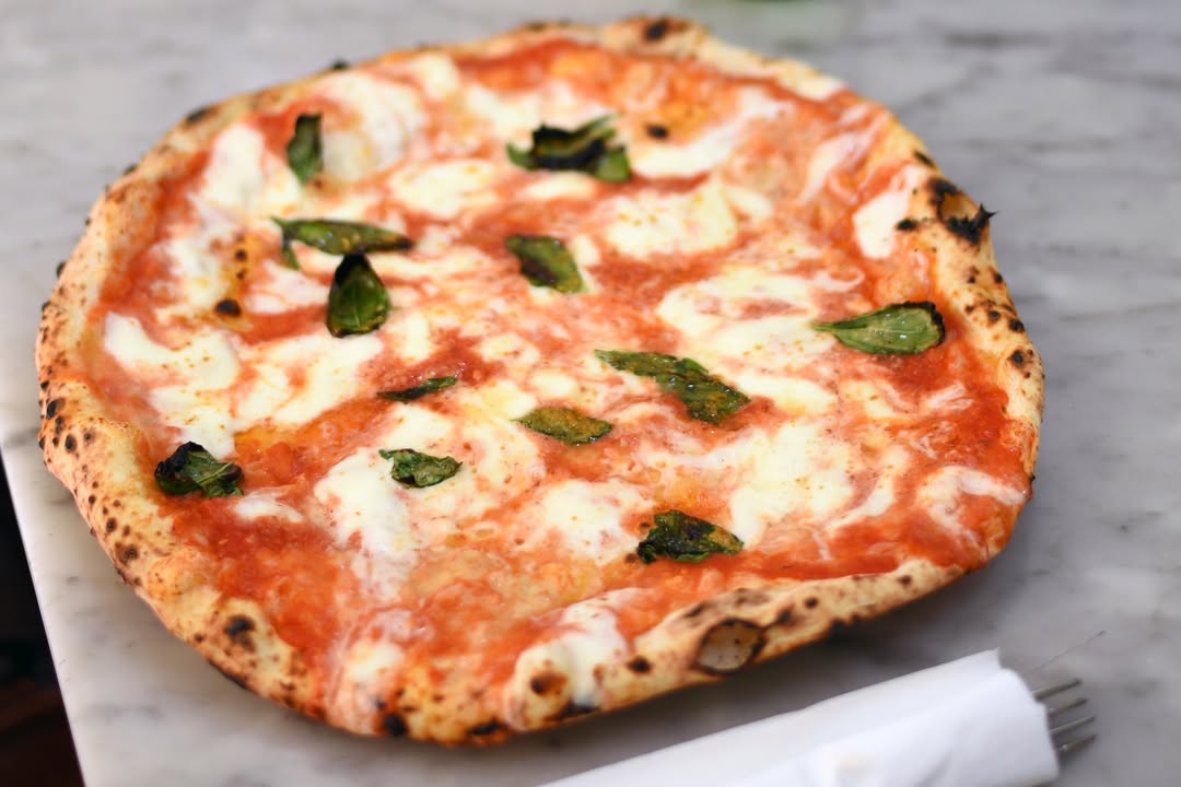 Antica Pizzeria Da Michele - Forcella: high quality photo of pizza