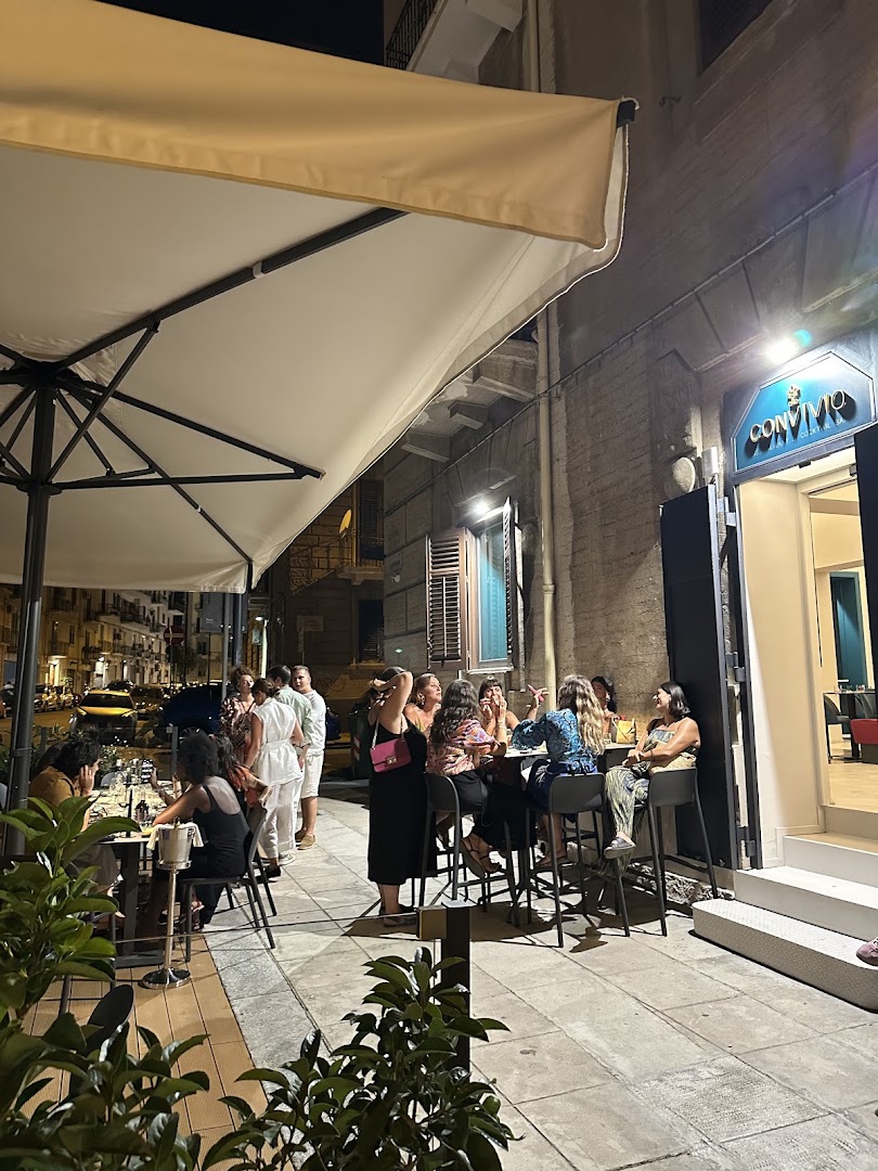 Convivio: inviting atmosphere with happy patrons