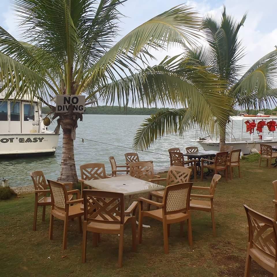 Rock Wharf Luminous Lagoon: inviting outdoor waterfront dining area