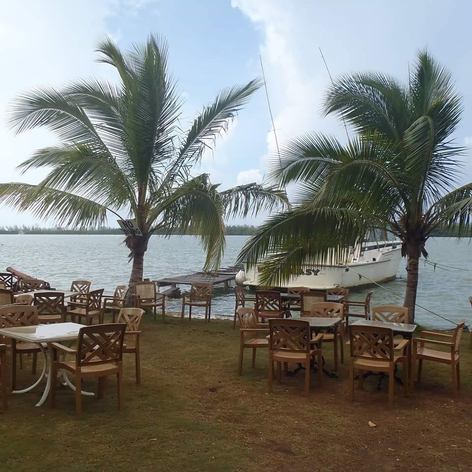 Rock Wharf Luminous Lagoon: inviting outdoor restaurant seating area
