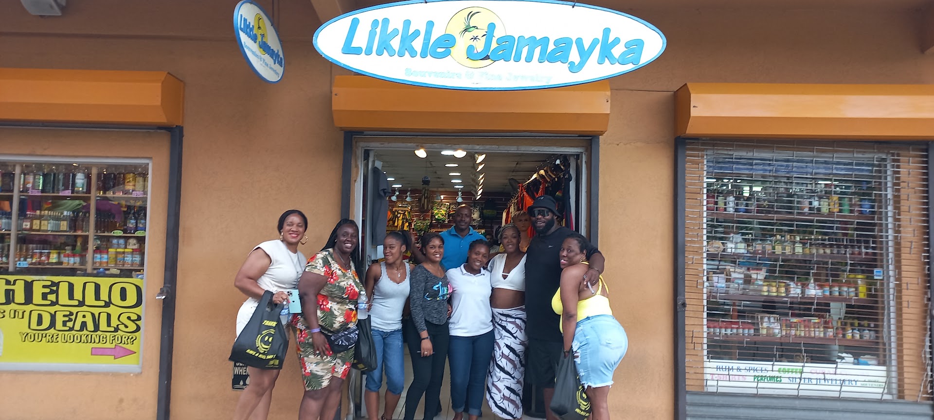 Likkle Jamayka: clear storefront with happy customers