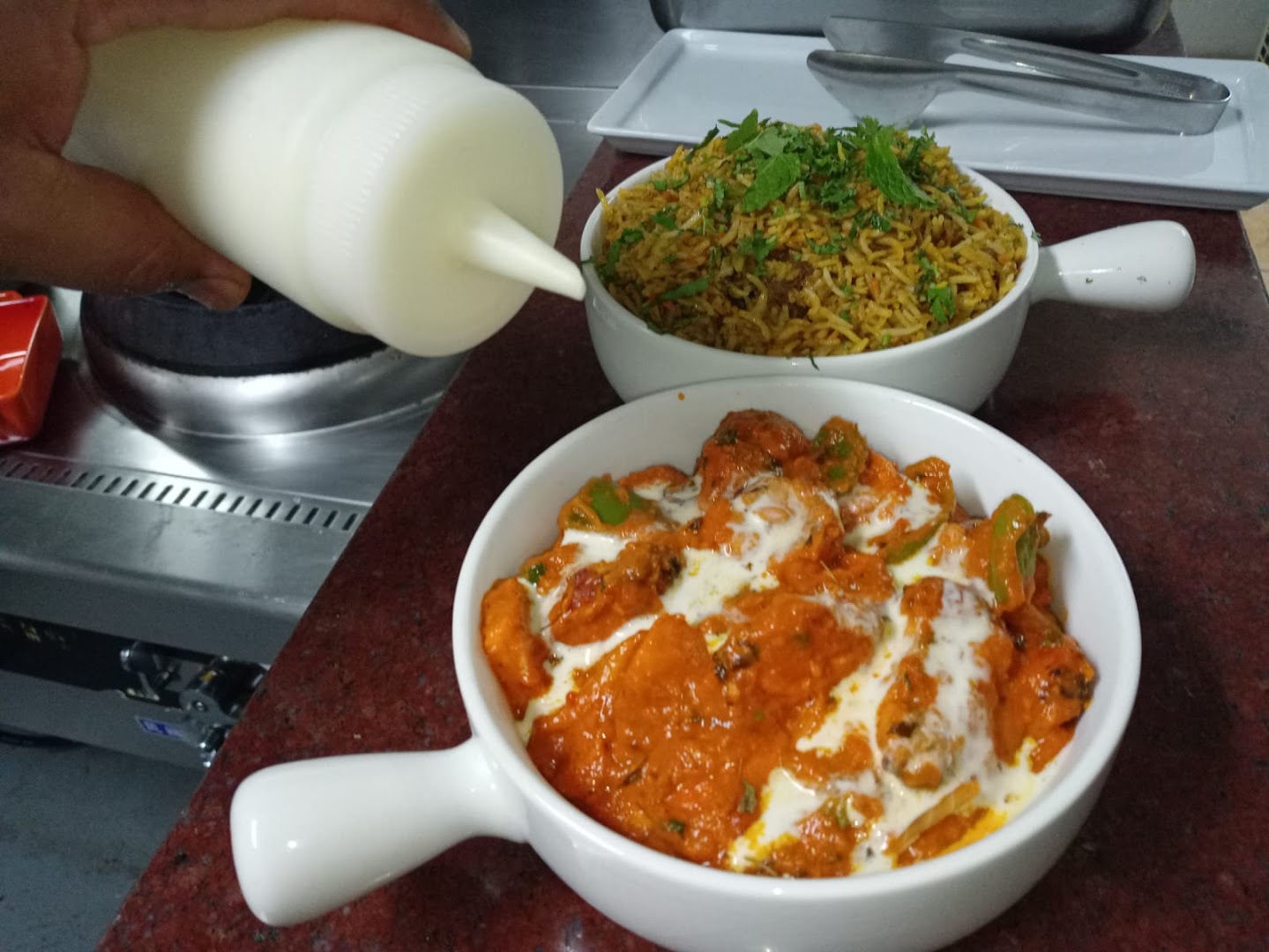 Manzil "East Meets West": appetizing food preparation shot