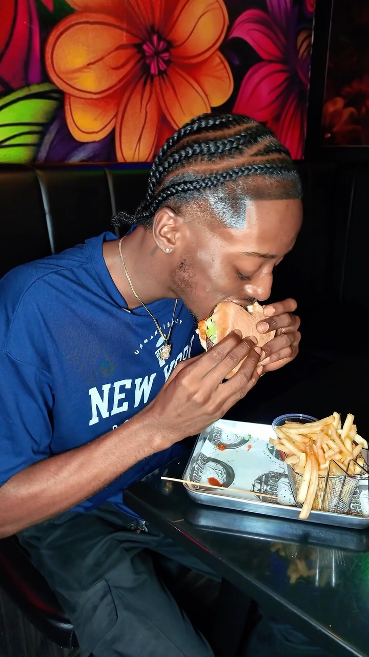 Papi Chulo: customer enjoying food at venue