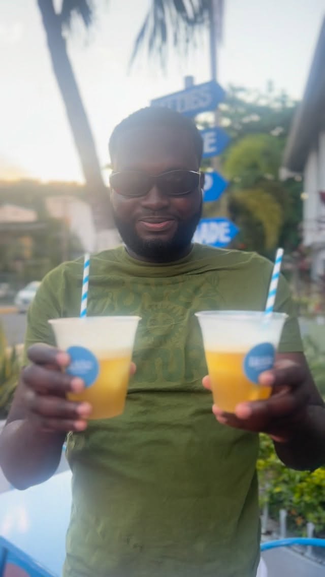 The Likkle Shoppe: happy customer enjoying drinks