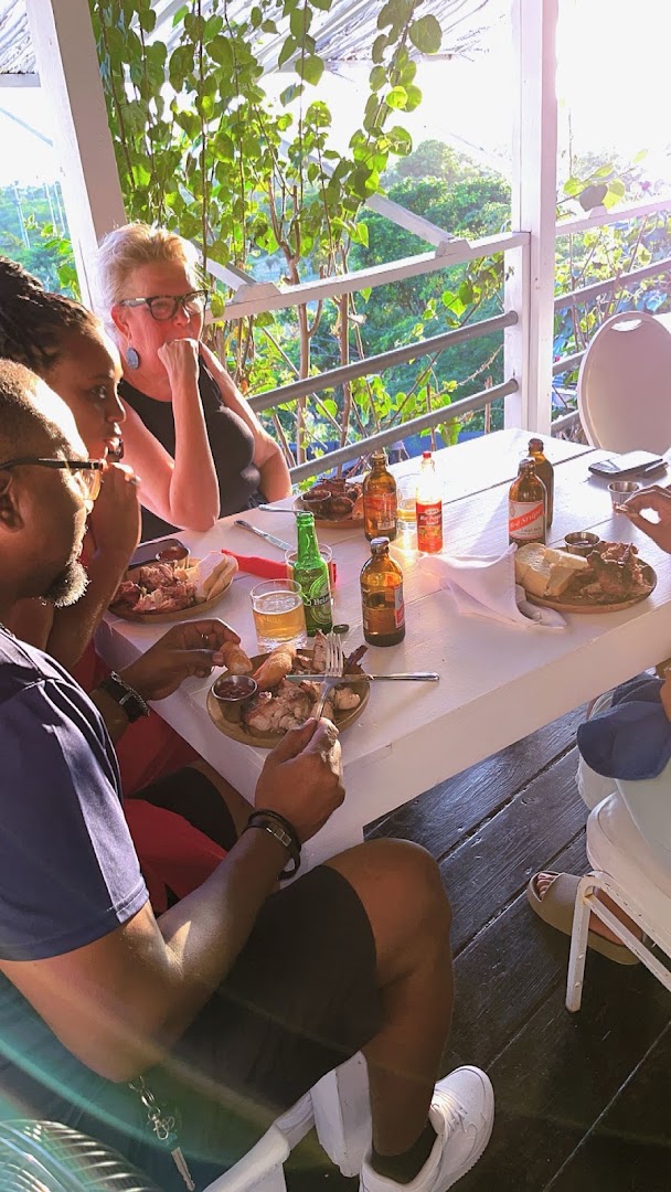 Coco T's Jerk Centre & Bar: customers enjoying the food
