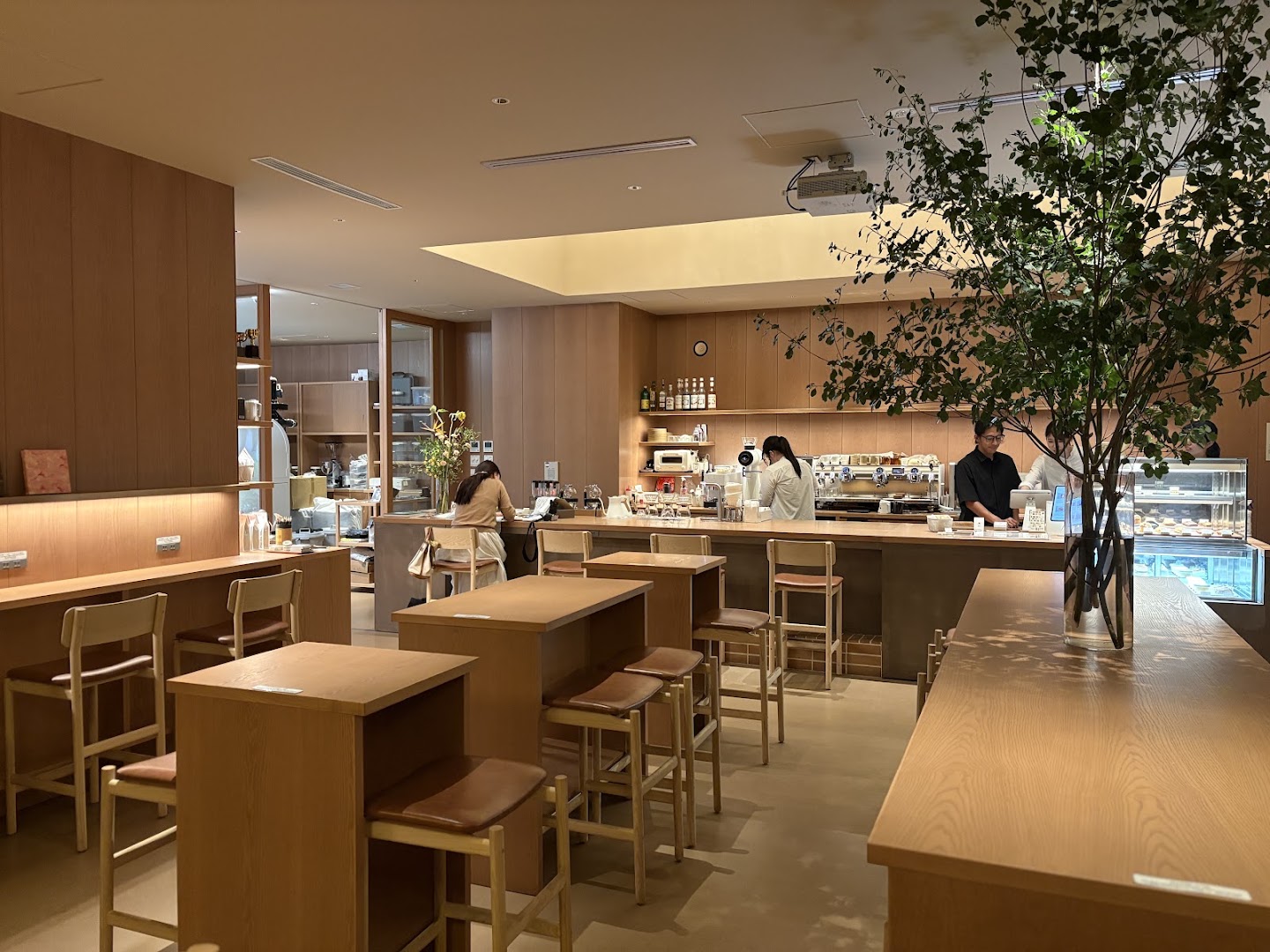 Sym Coffee Roasters: inviting and professional interior shot