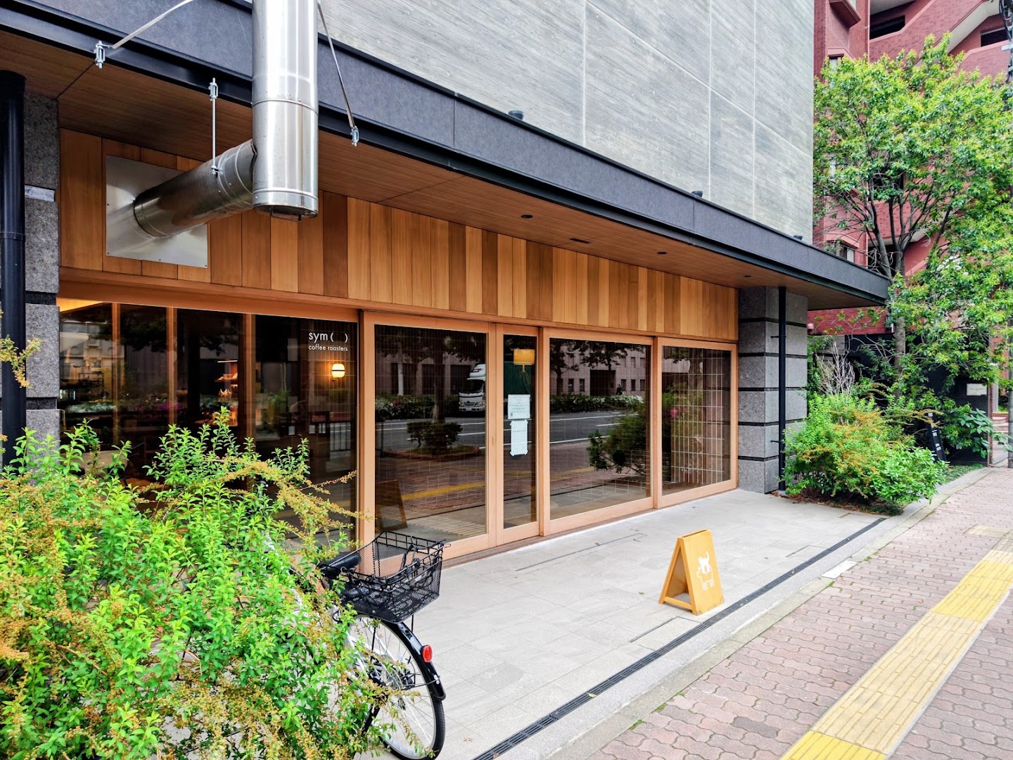 Sym Coffee Roasters: clear, professional exterior shot