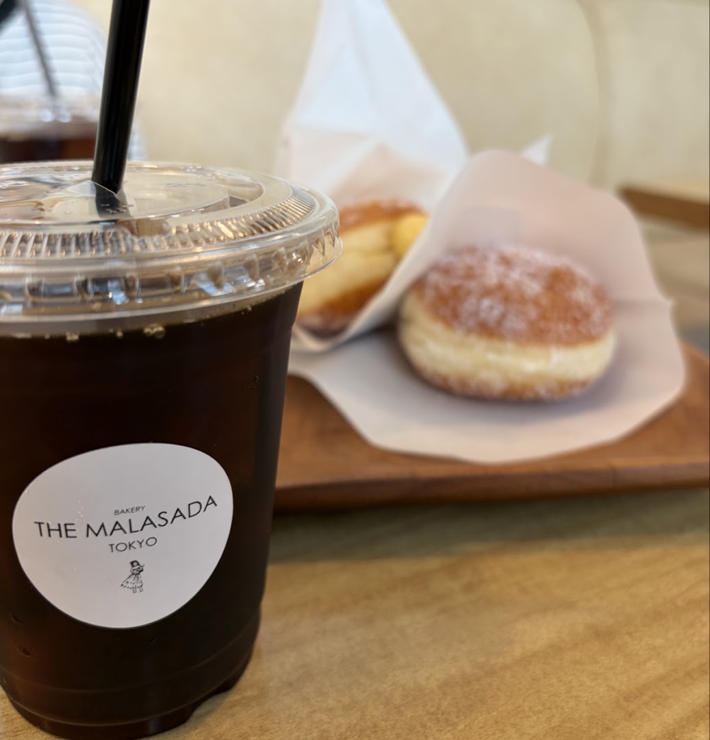 The Malasada Tokyo Naha: appetizing photo of food and drink
