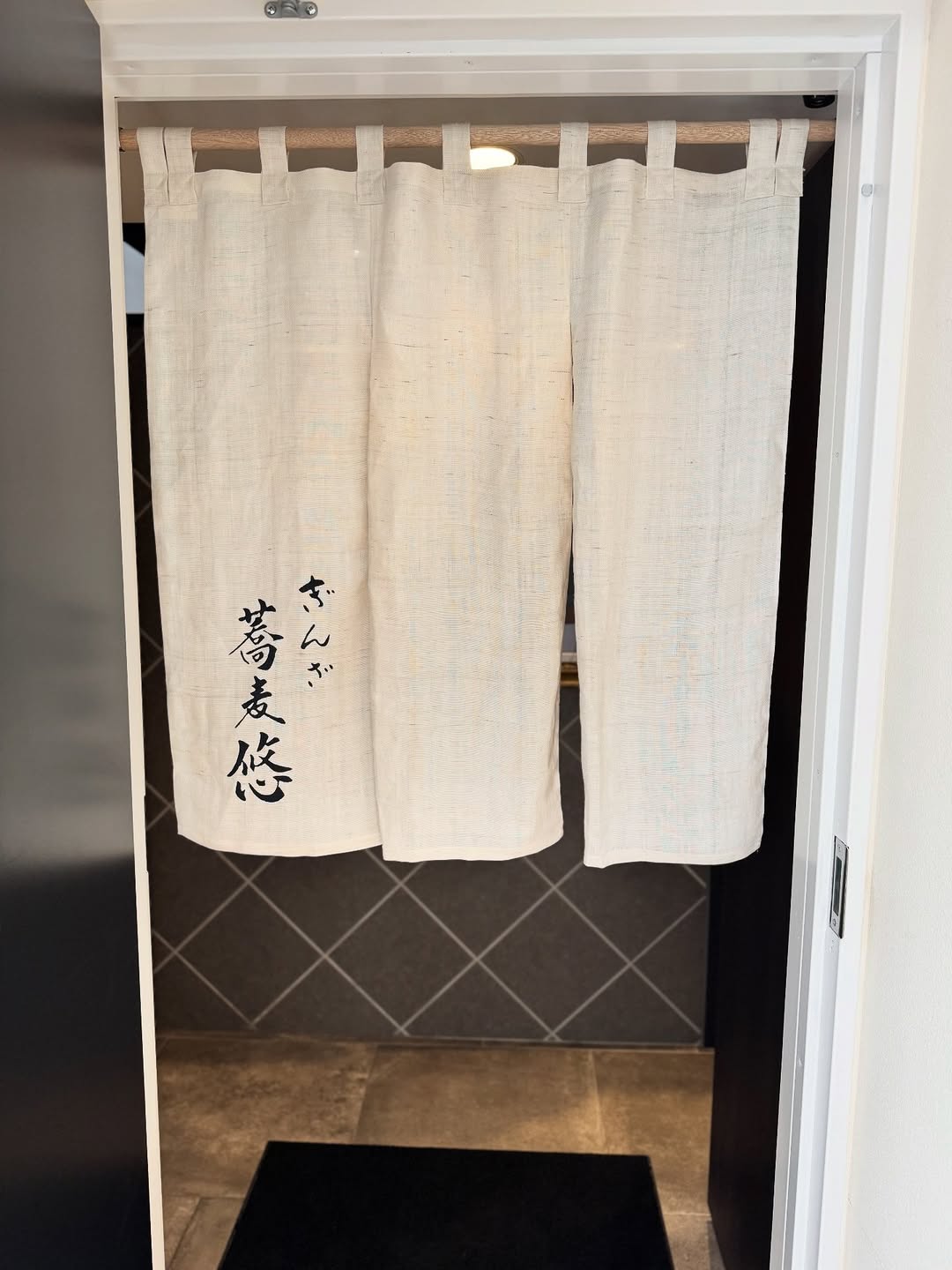 Soba Sasuga: clean entrance photo showing branding