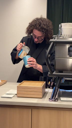 Vannelli Coffee: professional barista preparing coffee drink