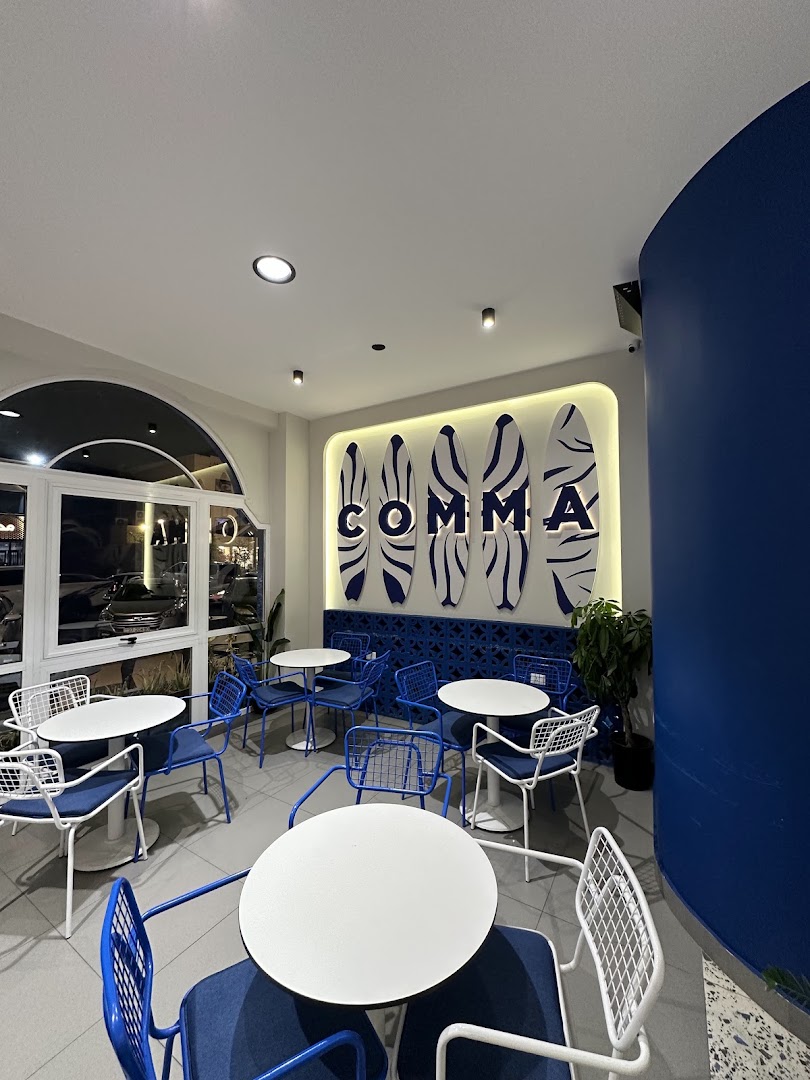 Comma Coffee Aqaba: clear, professional interior shot
