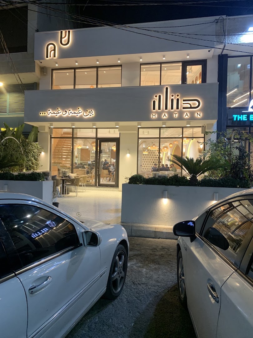 Hatan Coffee: clear, inviting exterior night shot