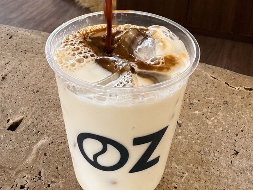 OZ Speciality Coffee: appetizing photo of branded coffee