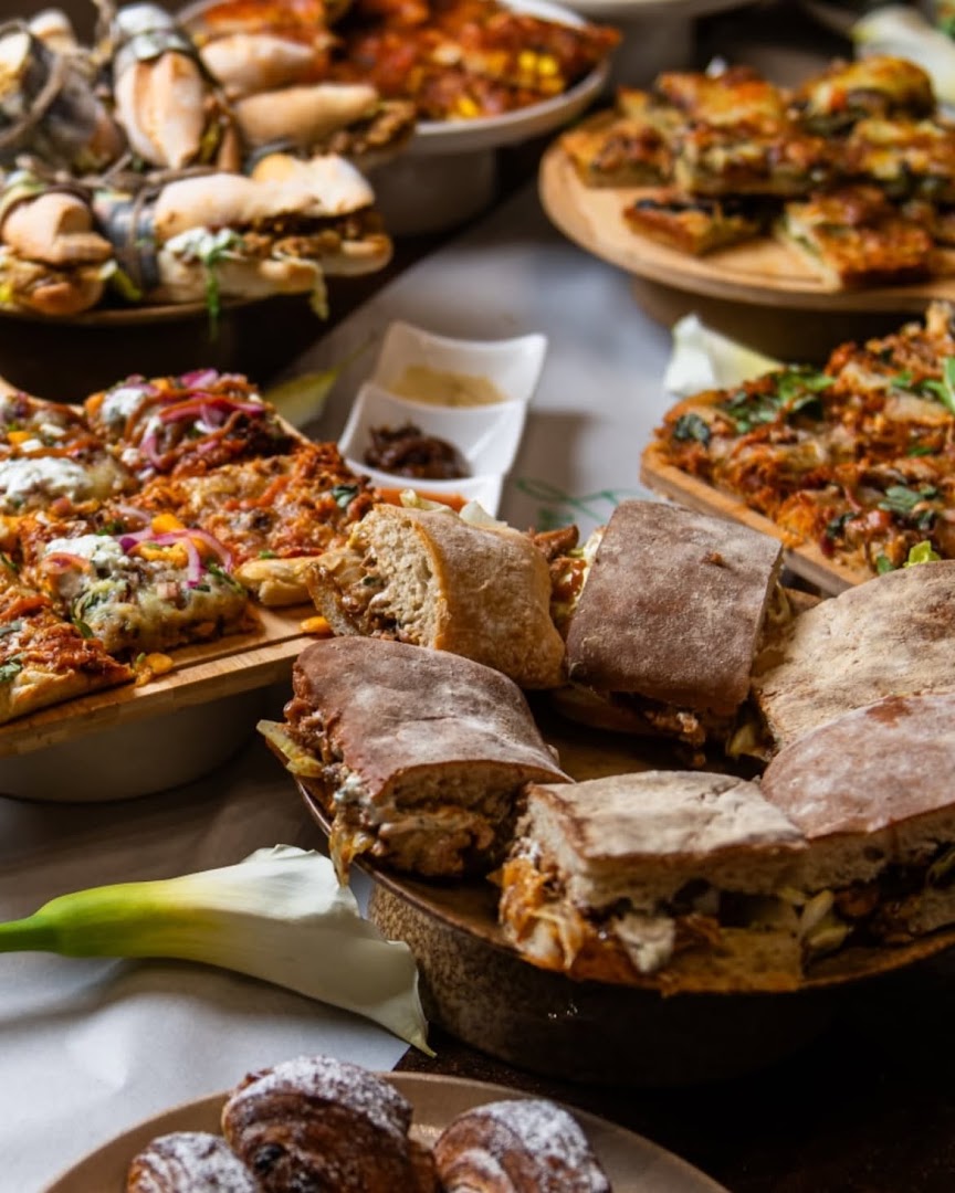 Knead Artisanal Bakery: appetizing display of bakery products