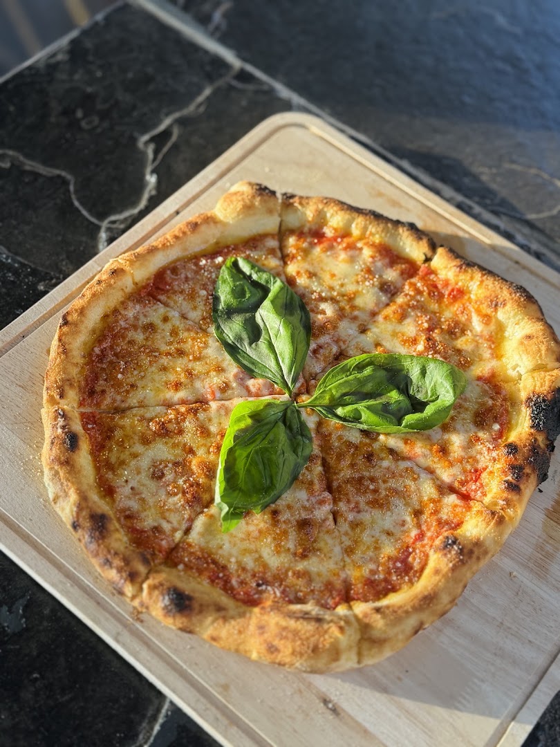 The Pizzeria: appetizing, high-quality pizza photo