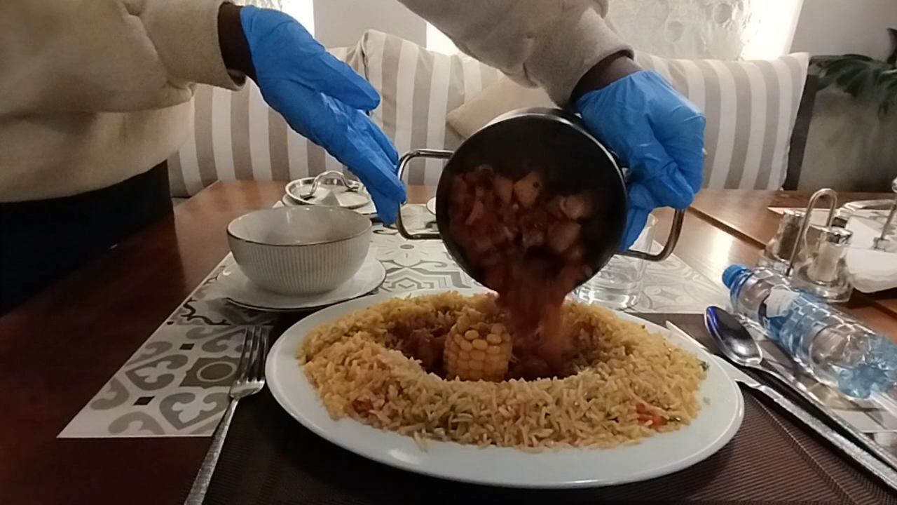 Zade Arabic Kitchen & Bistro: appetizing food preparation action shot