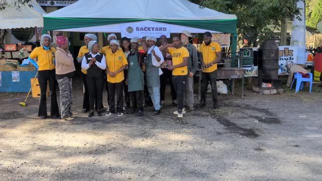 Backyard Smokehouse & Gardens: professional team photo at venue