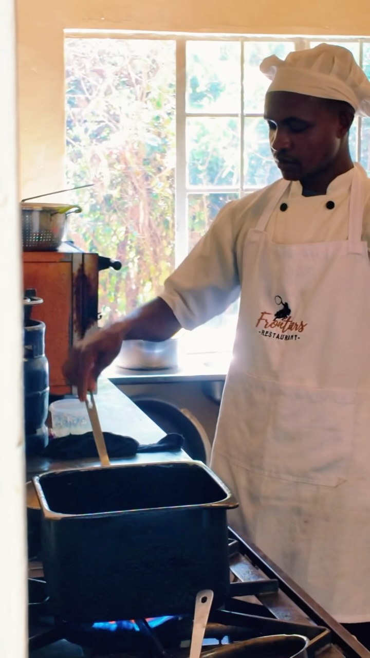 Frontiers Coffee Bar & Restaurant: professional photo of chef cooking