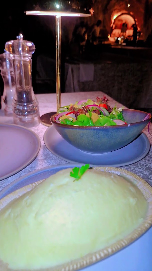 The Cave Watamu: appetizing food in restaurant setting