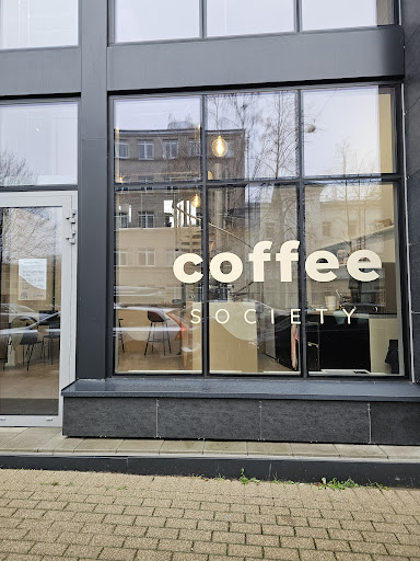 Coffee Society: clear storefront photo of venue