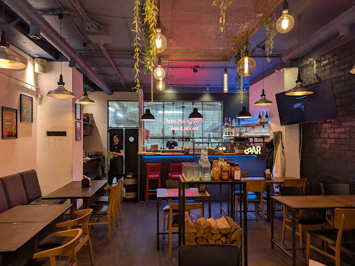 Fork The System BBQ: inviting and professional restaurant interior