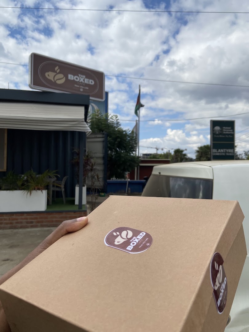 The Boxed Café: clear branding and venue exterior