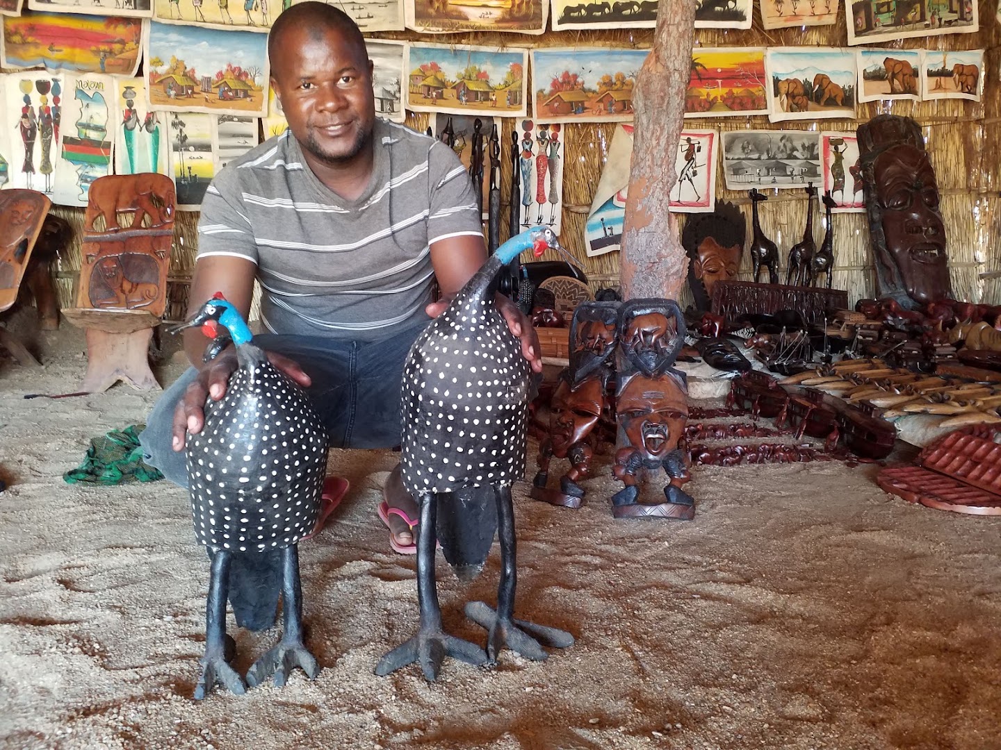 Senga Bay Sunset Souvenir Market: shop products and owner