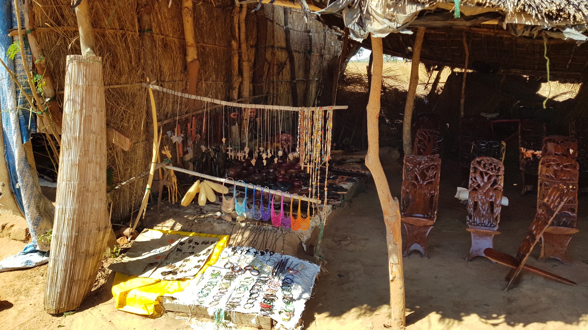 Senga Bay Sunset Souvenir Market: clear display of shop products