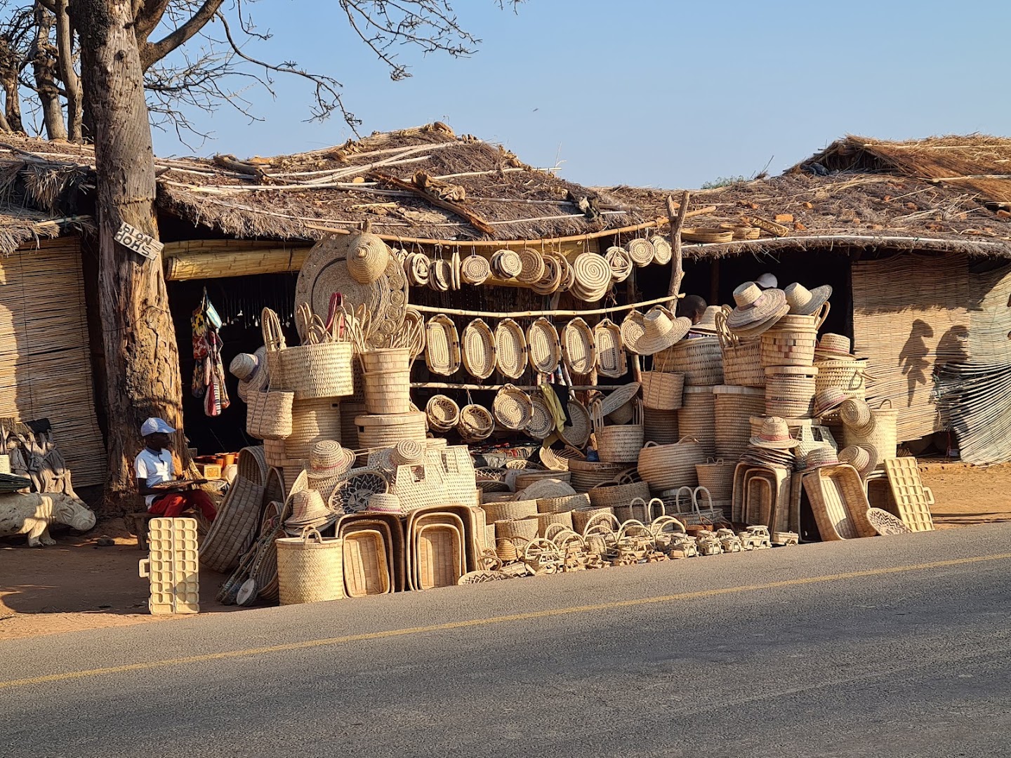 Senga Bay Sunset Souvenir Market: clear display of shop products