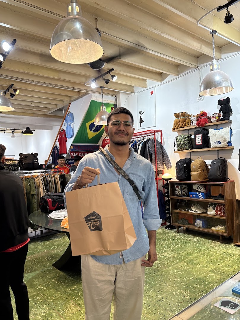 By Cent Dollars: customer enjoying the shop