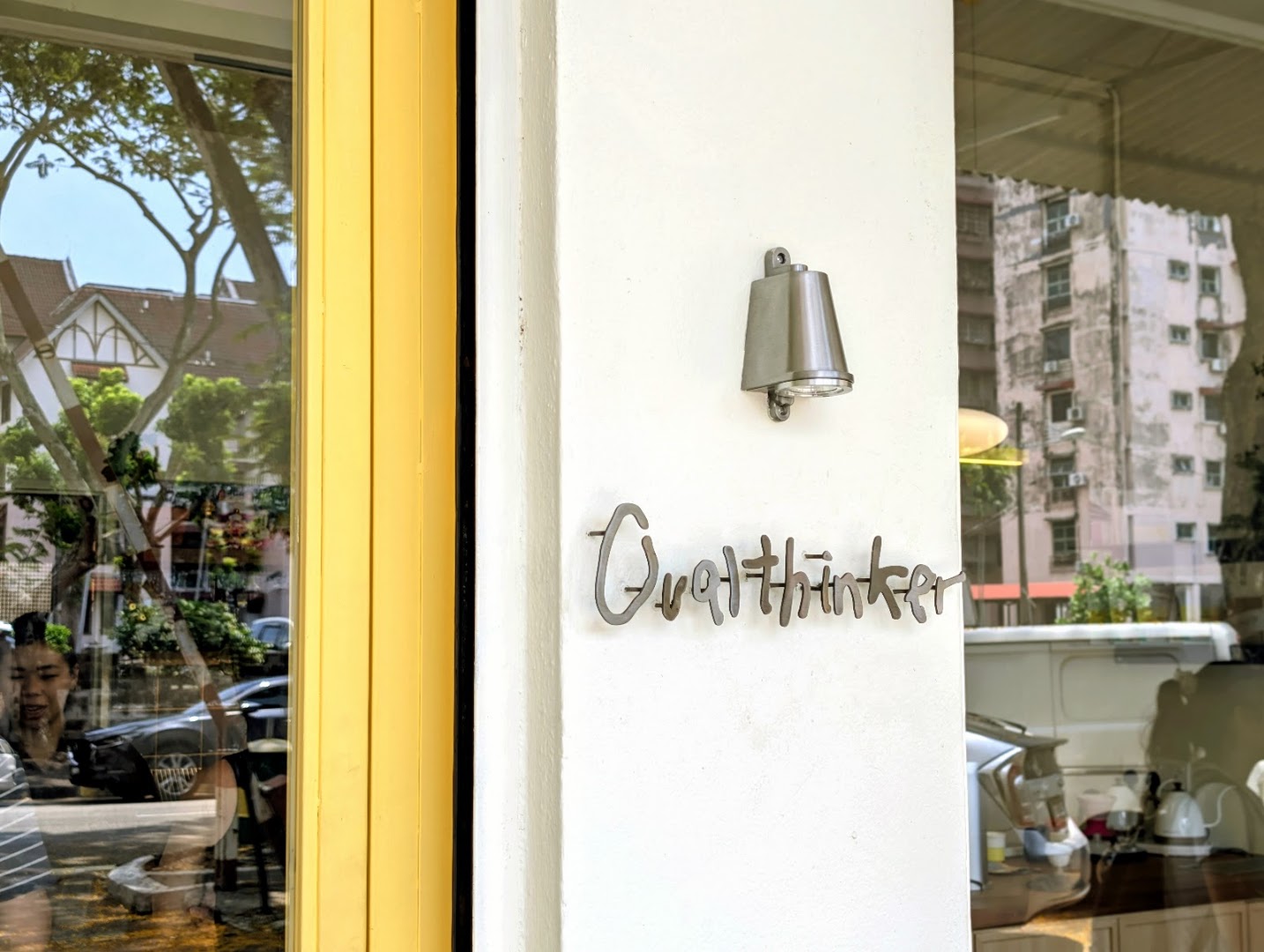 Ovalthinker Coffee: clear, professional shot of signage