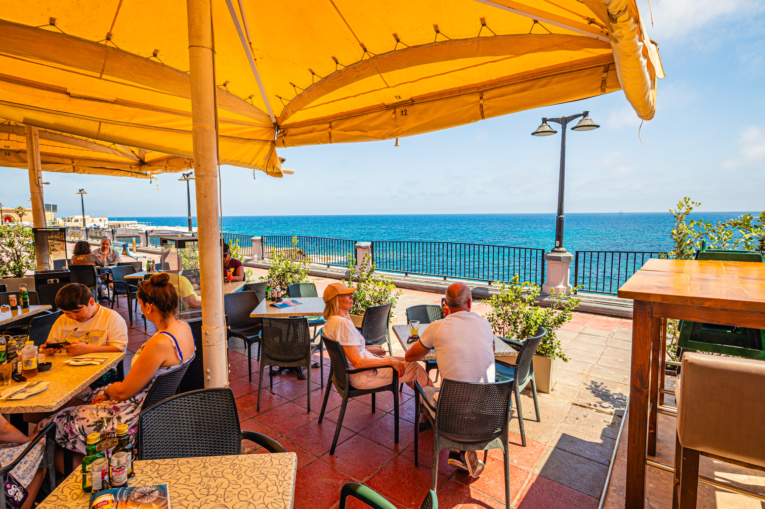 Compass Lounge: inviting terrace with ocean view