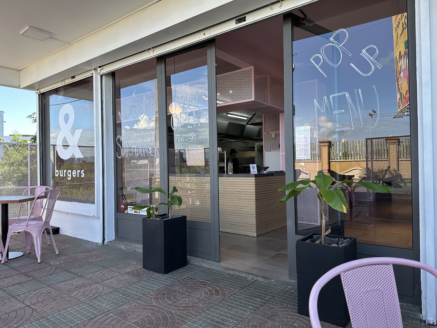And Burgers: clear exterior view of restaurant