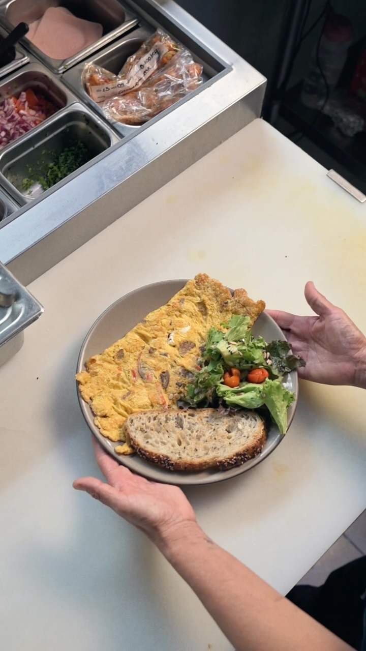 Las Moras Café: appetizing food presentation in kitchen