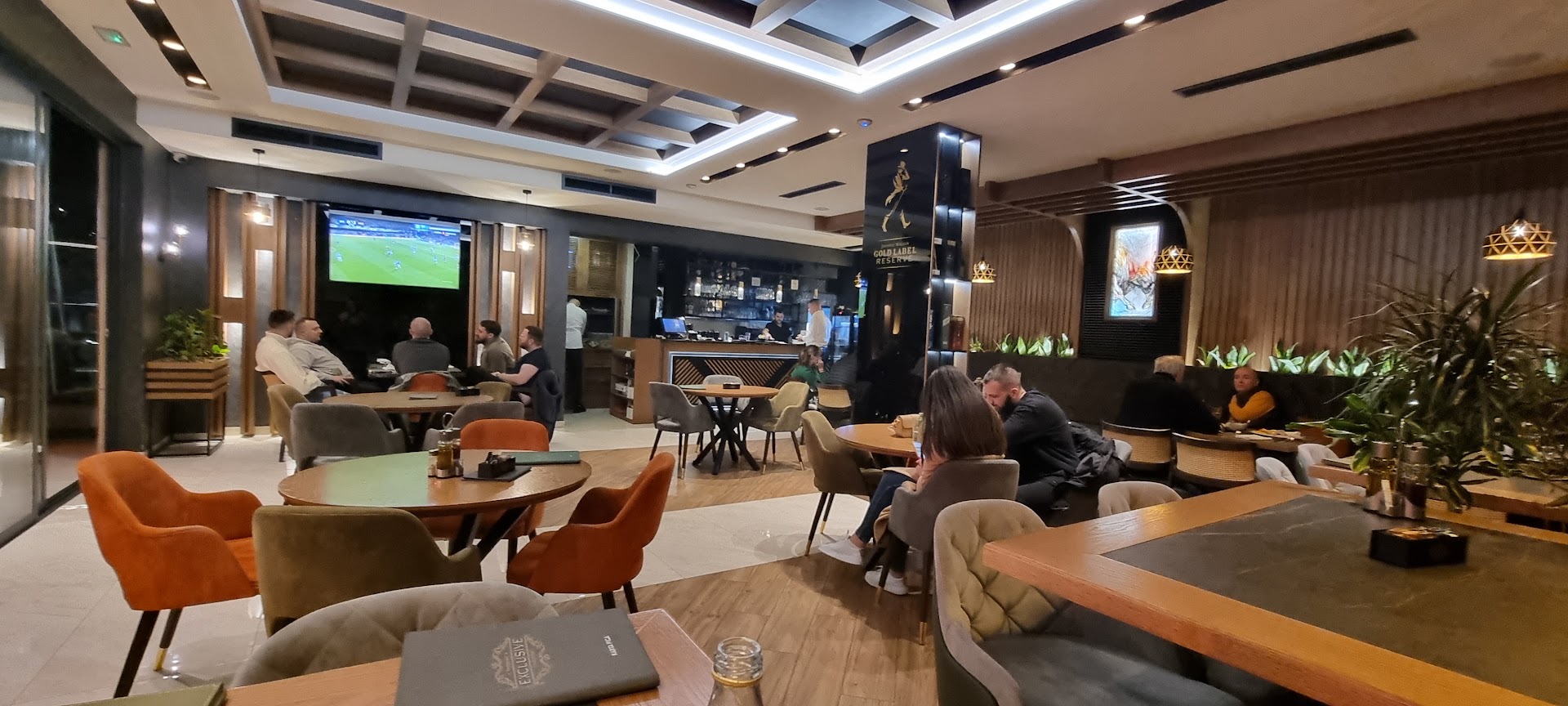 Exclusive Restaurant & Event Centar: clear, inviting restaurant interior shot