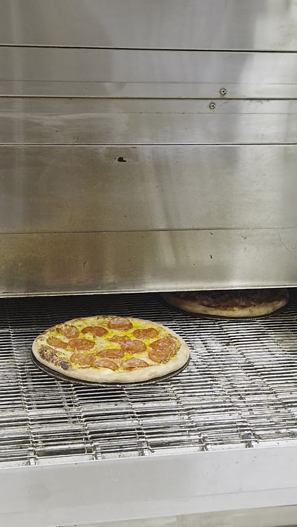 Dodo Pizza: appetizing photo of pizza cooking