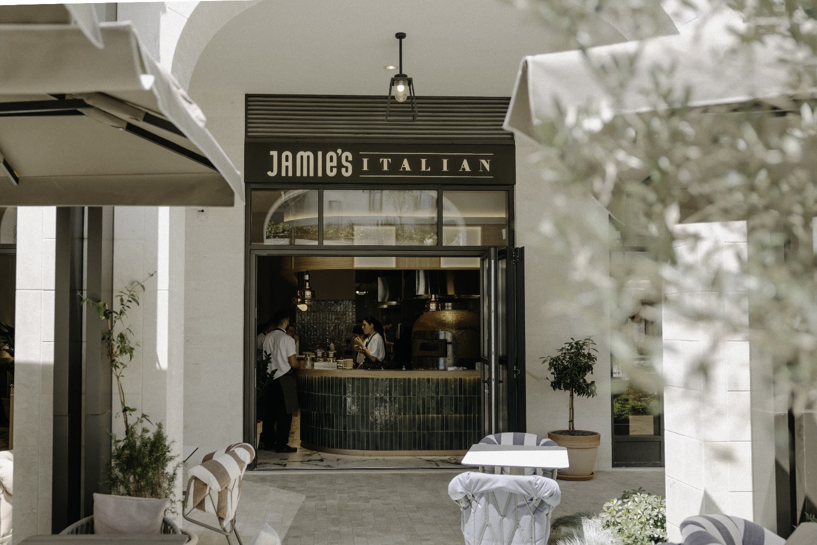 Jamie's Italian Montenegro: professional, inviting restaurant exterior shot