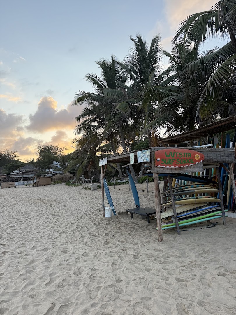 Wutsita Surf School: storefront and surf equipment