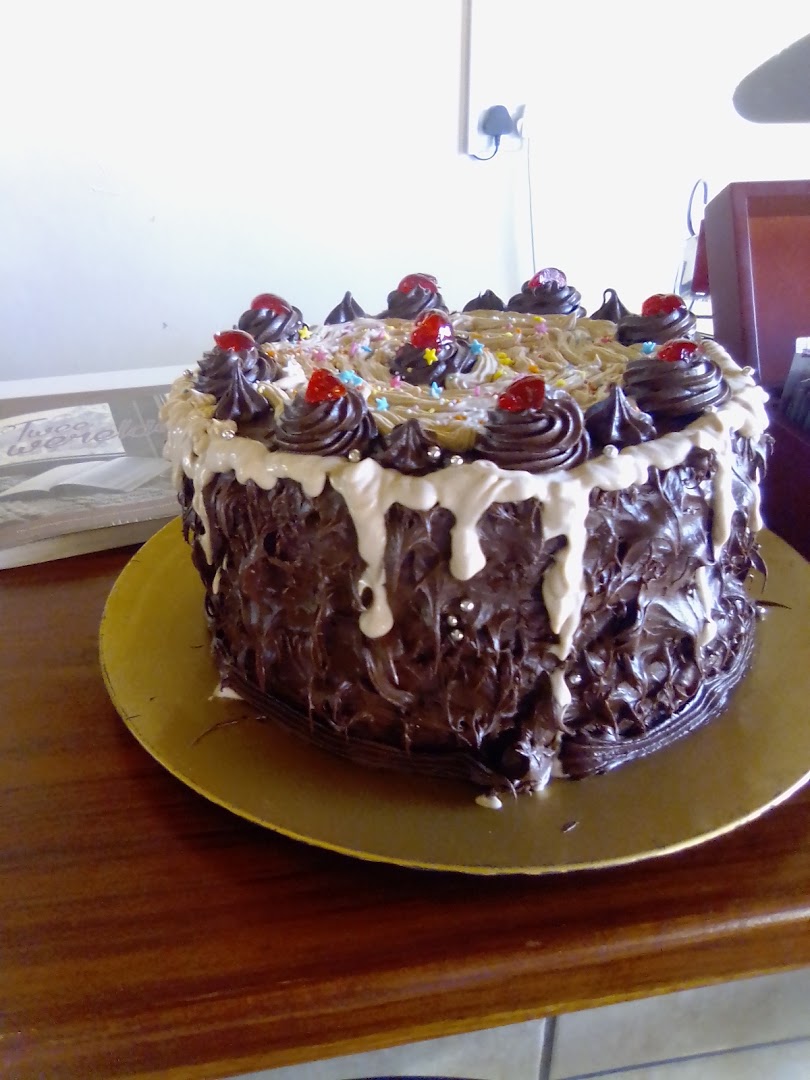 Illy Coffee Shop and Tourist Info Centre: appetizing photo of a cake