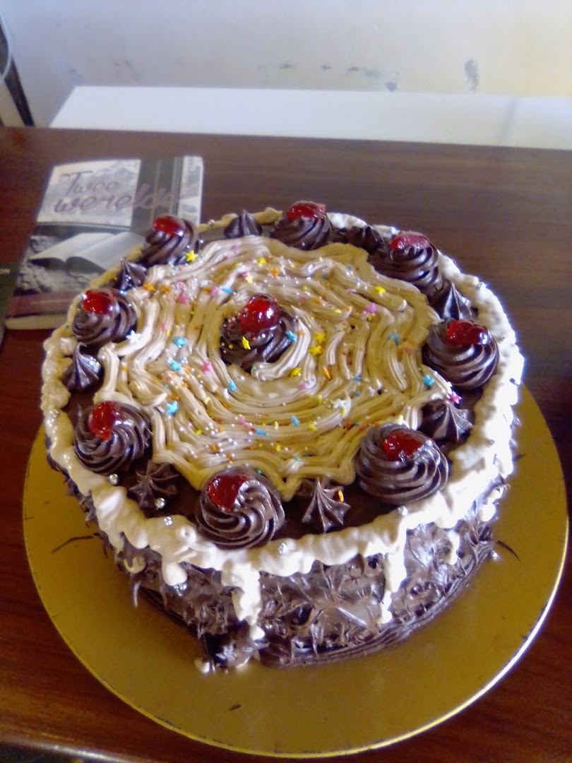 Illy Coffee Shop and Tourist Info Centre: appetizing photo of a cake
