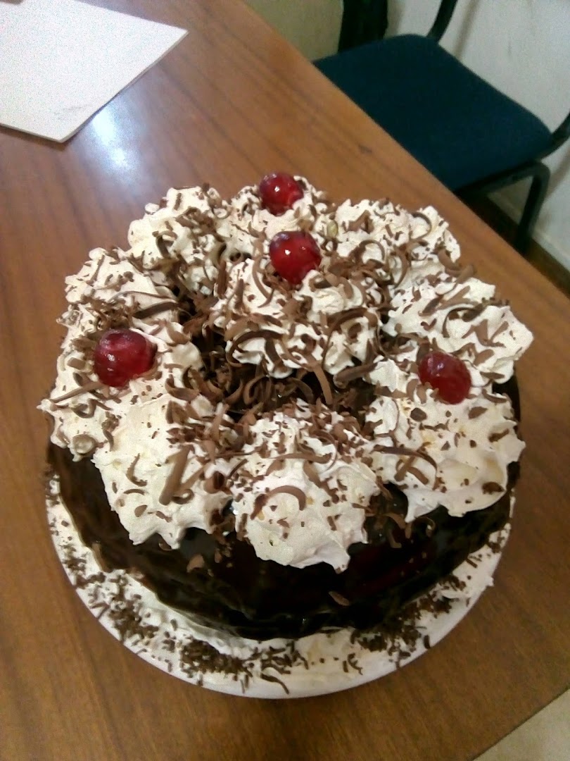 Illy Coffee Shop and Tourist Info Centre: appetizing photo of a cake
