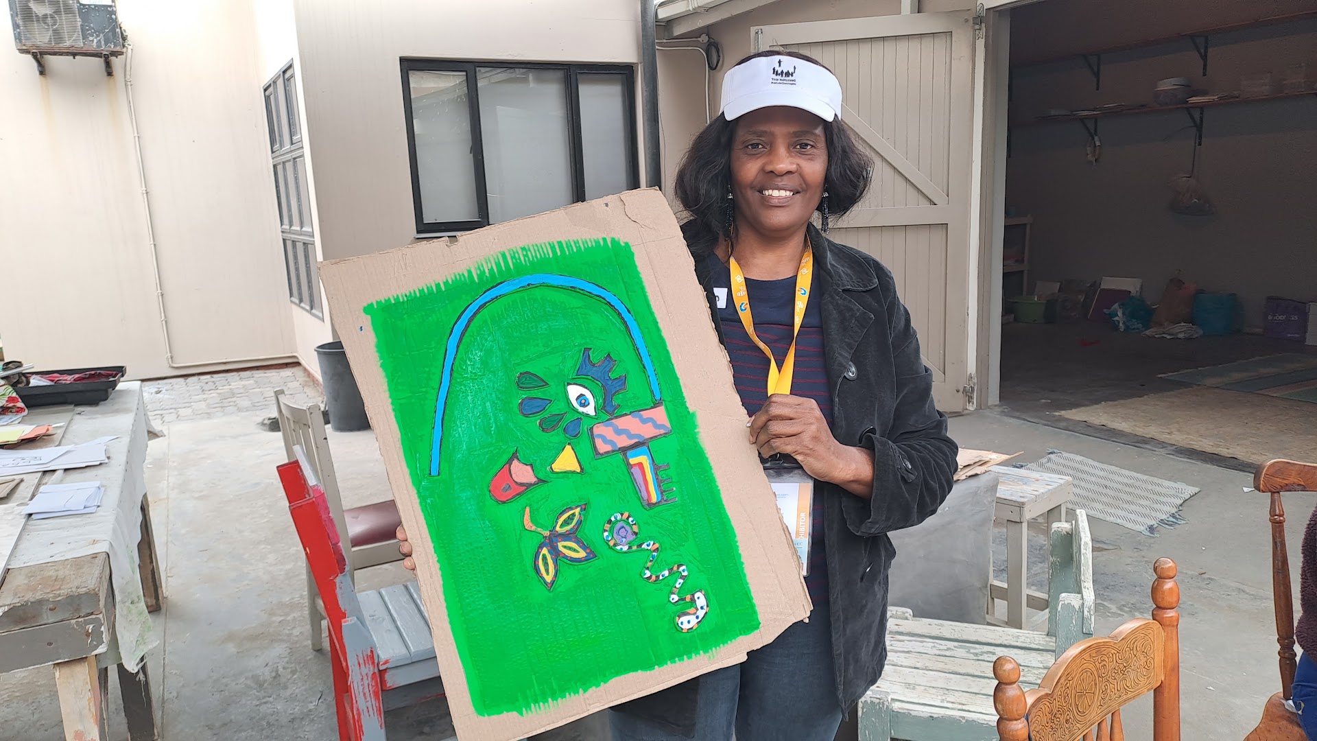 NOMAD Home of the Arts: artist with their work