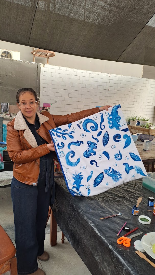 NOMAD Home of the Arts: artist with creative work