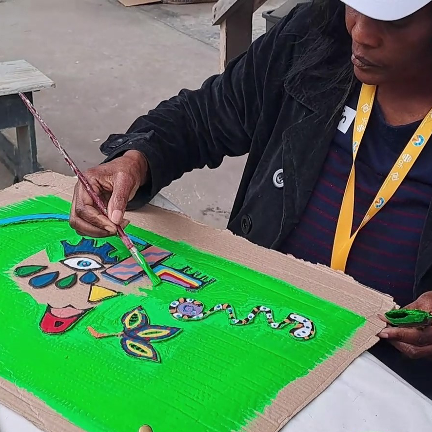 NOMAD Home of the Arts: artist creating artwork