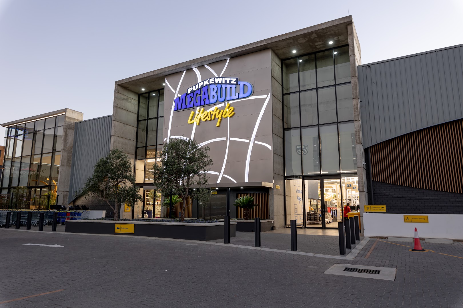 Pupkewitz Megabuild Lifestyle: clear professional storefront exterior shot