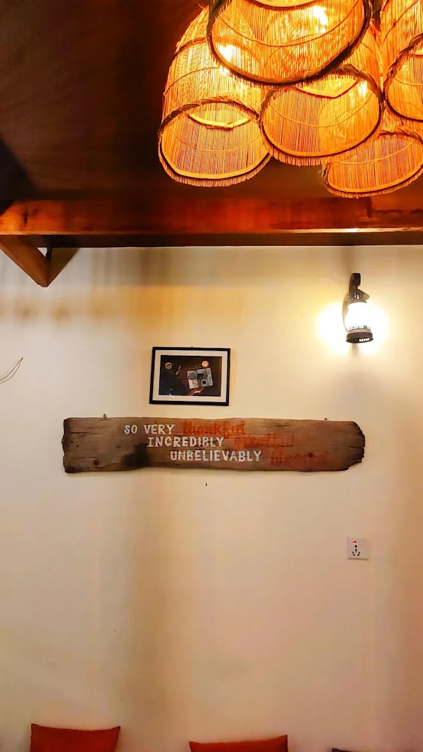 Himalaya Gurkha Coffee House: cozy interior with warm lighting