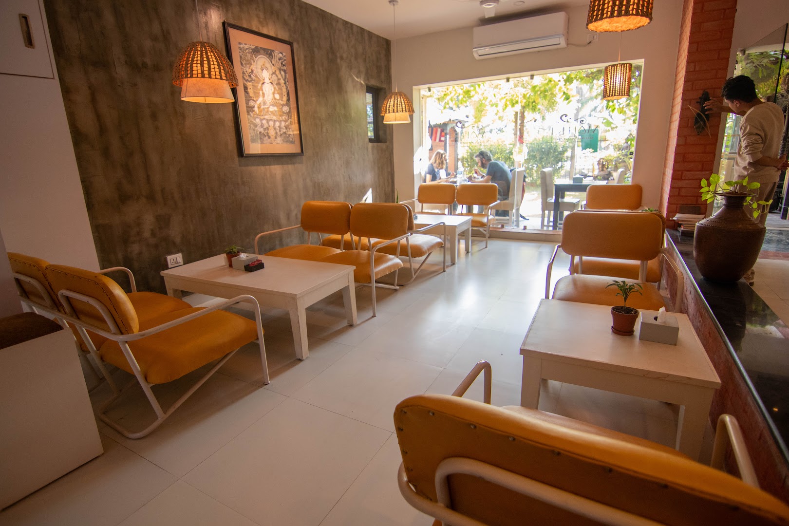 Maitri Restaurant | Cafe | Bar: clear, inviting interior atmosphere