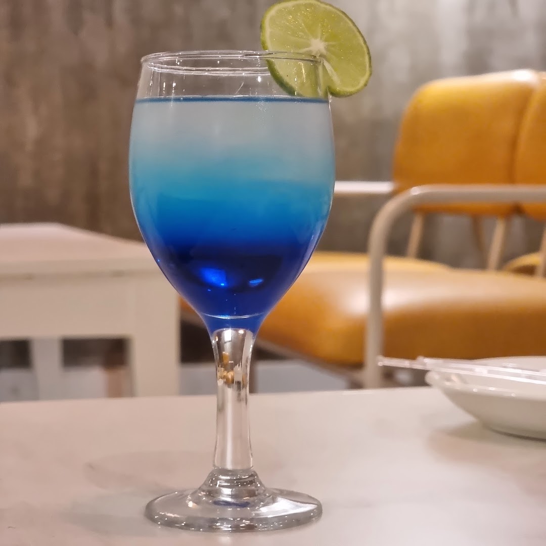 Maitri Restaurant | Cafe | Bar: appealing photo of a cocktail