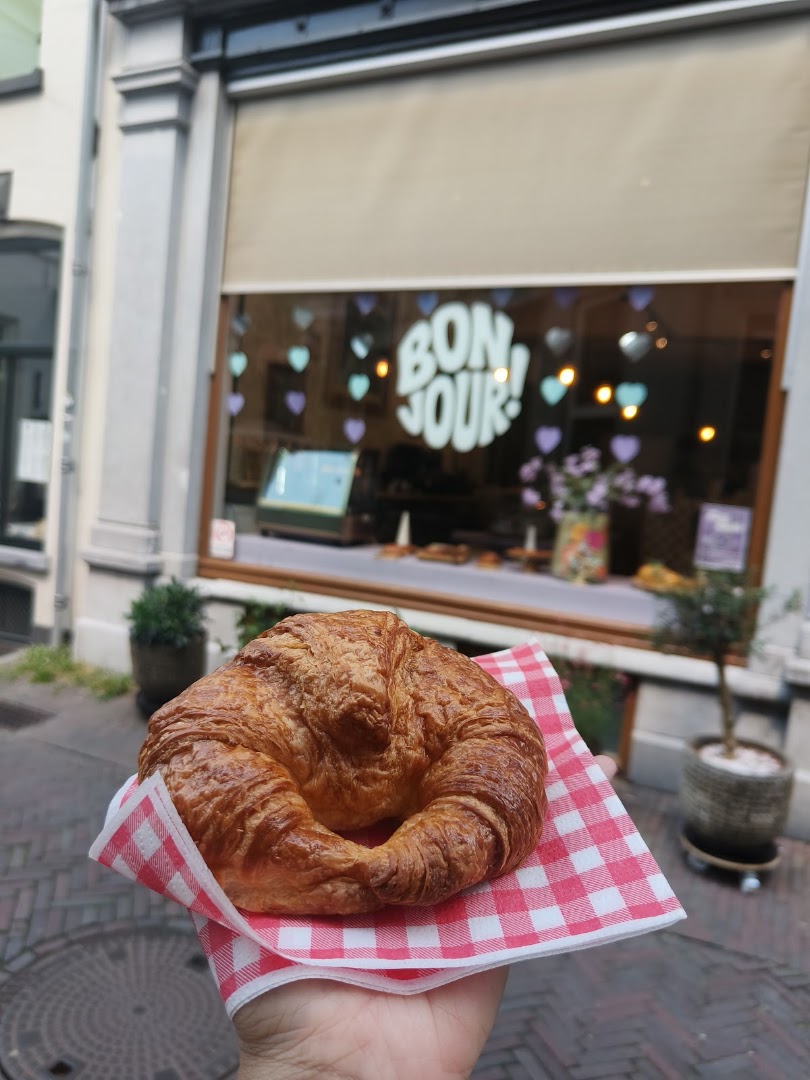 Bonjour Croissanterie: appetizing food with venue background